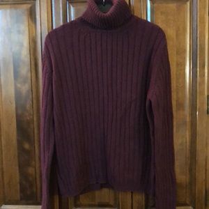 Burgundy Turtleneck sweater.